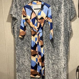 Silky, colorful retro dress size medium. New without tags.